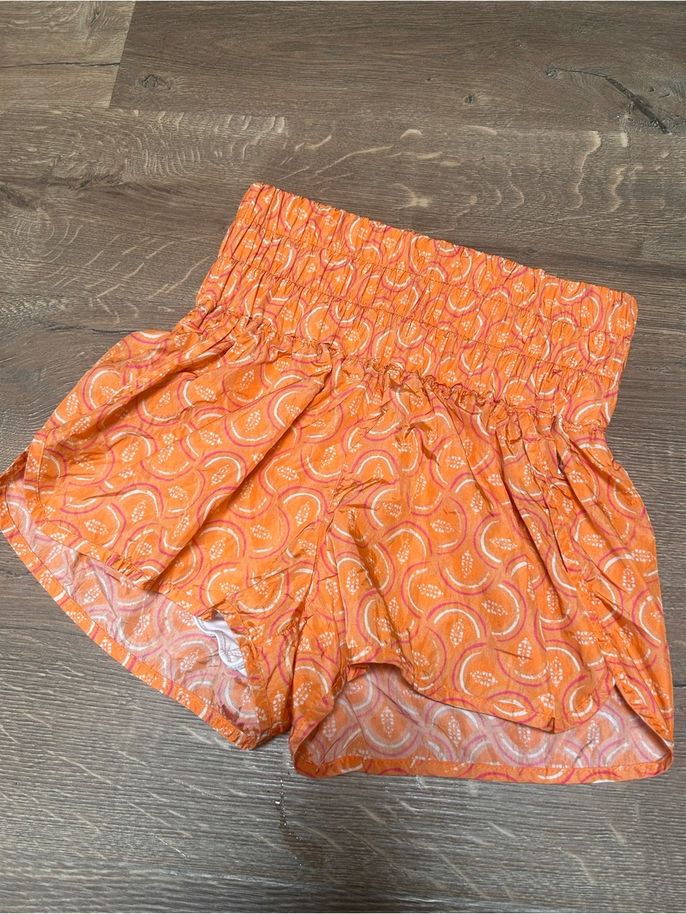Free People “The Way Home” Smocked Waist Orange Patterned Summer Shorts (S)